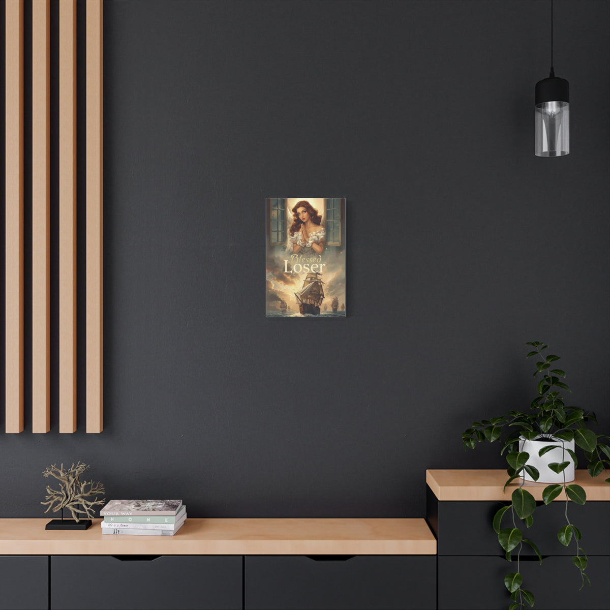 Blessed Loser Design Canvas Wall Art displayed on a dark wall in a modern living room setting.