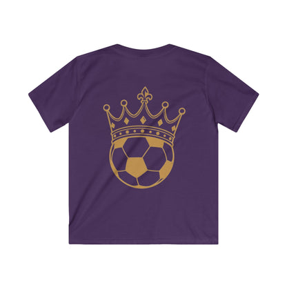 Kids Tee — 'FASTT' Soccer Ball with Crown Graphic Youth футболка featuring a gold crown and soccer ball design on purple fabric.