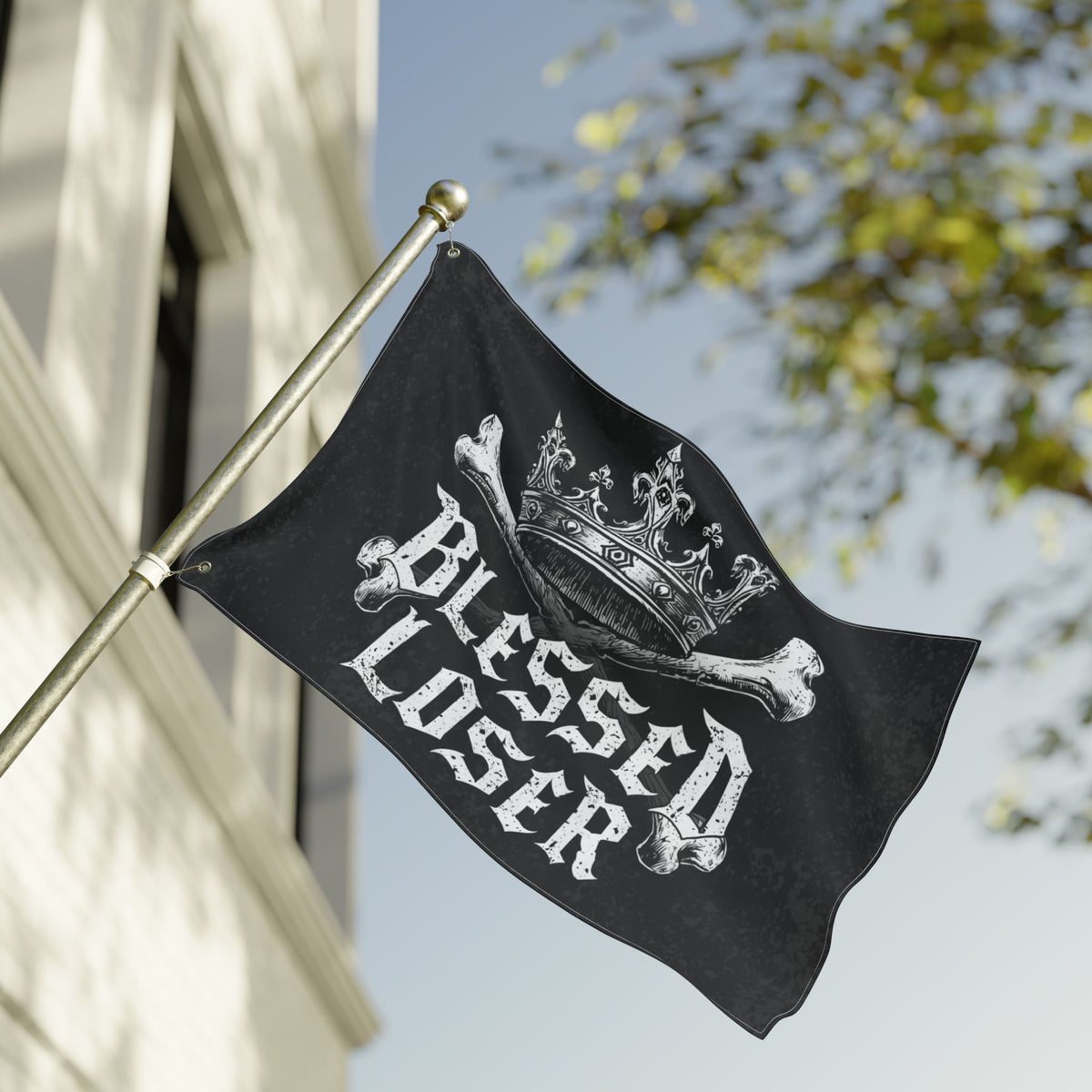 Blessed loser Black flag displayed outdoors, featuring a crown and artistic design, perfect for unique garden decor.