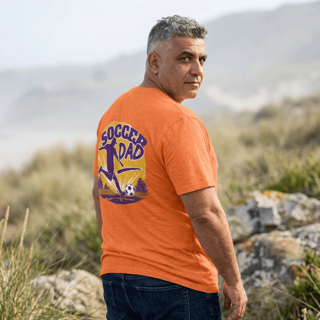Soccer Dad T-Shirt — Retro Soccer Dad Tee, Father’s Day Gift in heather orange, showcasing playful team spirit with bold design.